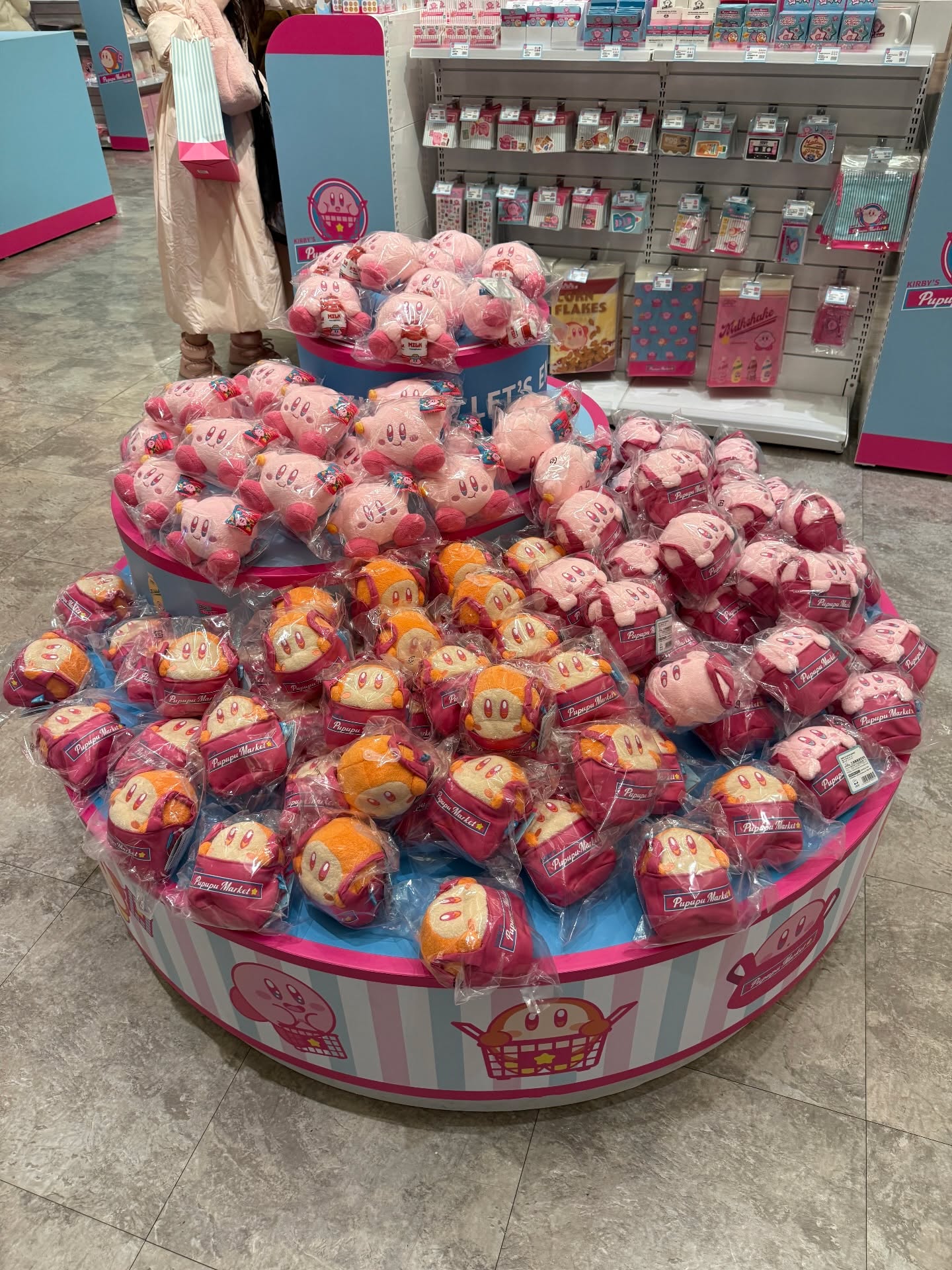 May be an image of toy, cupcake, candy and text